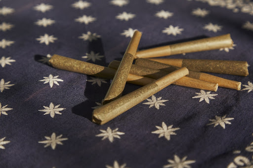 A group of seven brown pre-rolls